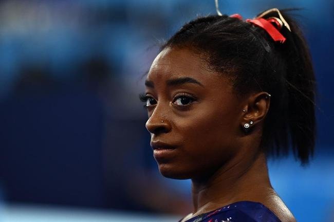 Fotos de Simone Biles durante os Jogos de Tquio
