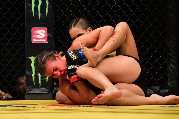 Fotos da grande vitória de Amanda Nunes pelo cinturão do UFC