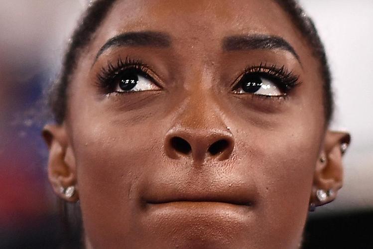 Fotos de Simone Biles durante os Jogos de Tóquio