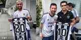 Otamendi e Messi receberam uma camisa personalizada