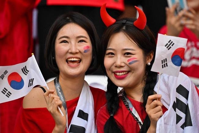 Torcedores de Coreia do Sul e Gana na partida pelo Grupo H da Copa do Mundo do Catar