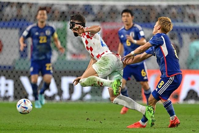 Lances da partida entre Japo e Crocia, pelas oitavas de final da Copa do Mundo.
