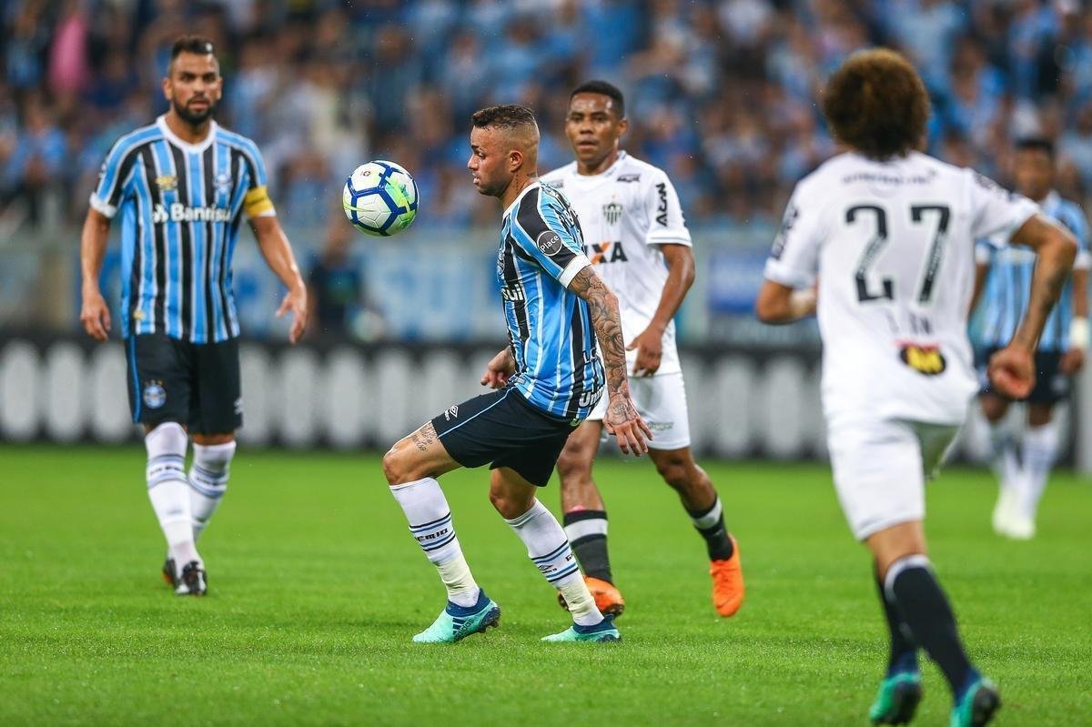 Grmio jogou melhor e conseguiu vitria por 2 a 0 sobre o Atltico na Arena, em Porto Alegre, pela 13 rodada do Campeonato Brasileiro