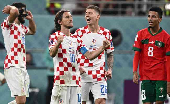 Jogadores croatas comemoram na vitria sobre Marrocos
