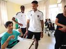 Elenco do Atltico visita ONG para 'reforar unio e solidariedade'