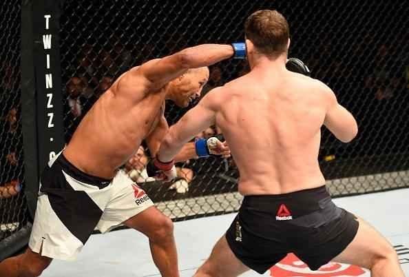 Na luta principal do UFC 204, em Manchester, Michael Bisping supera Dan Henderson em polêmica decisão unânime dos juízes e tem sucesso na primeira defesa de cinturão do peso médio
