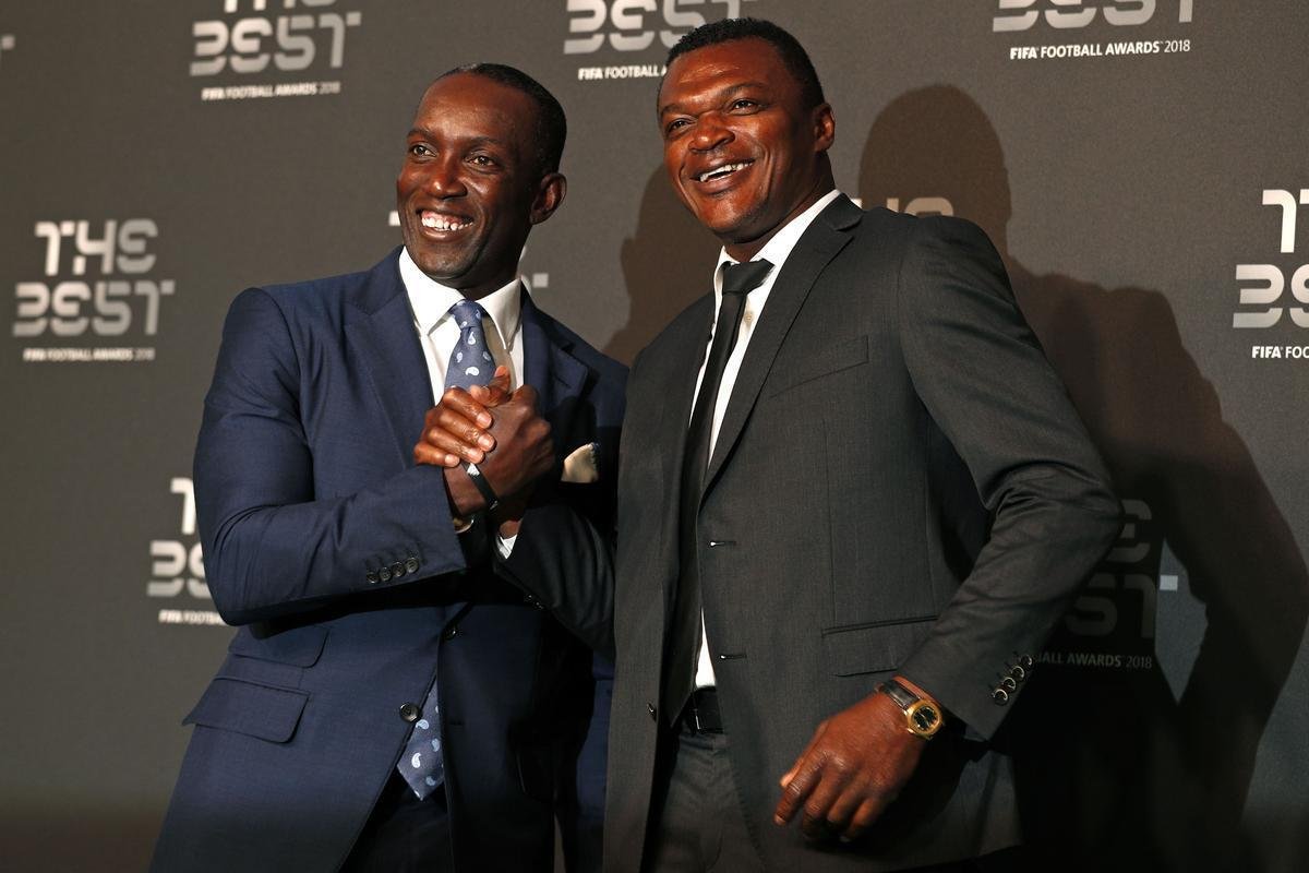 Os ex-craques Dwight Yorke e Marcel Desailly 