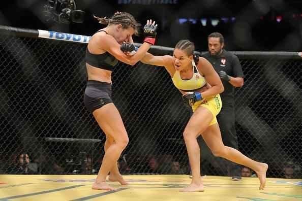 Fotos da grande vitória de Amanda Nunes pelo cinturão do UFC