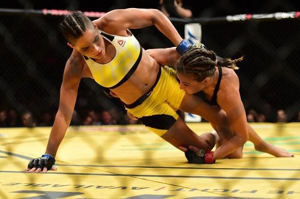 Fotos da grande vitória de Amanda Nunes pelo cinturão do UFC
