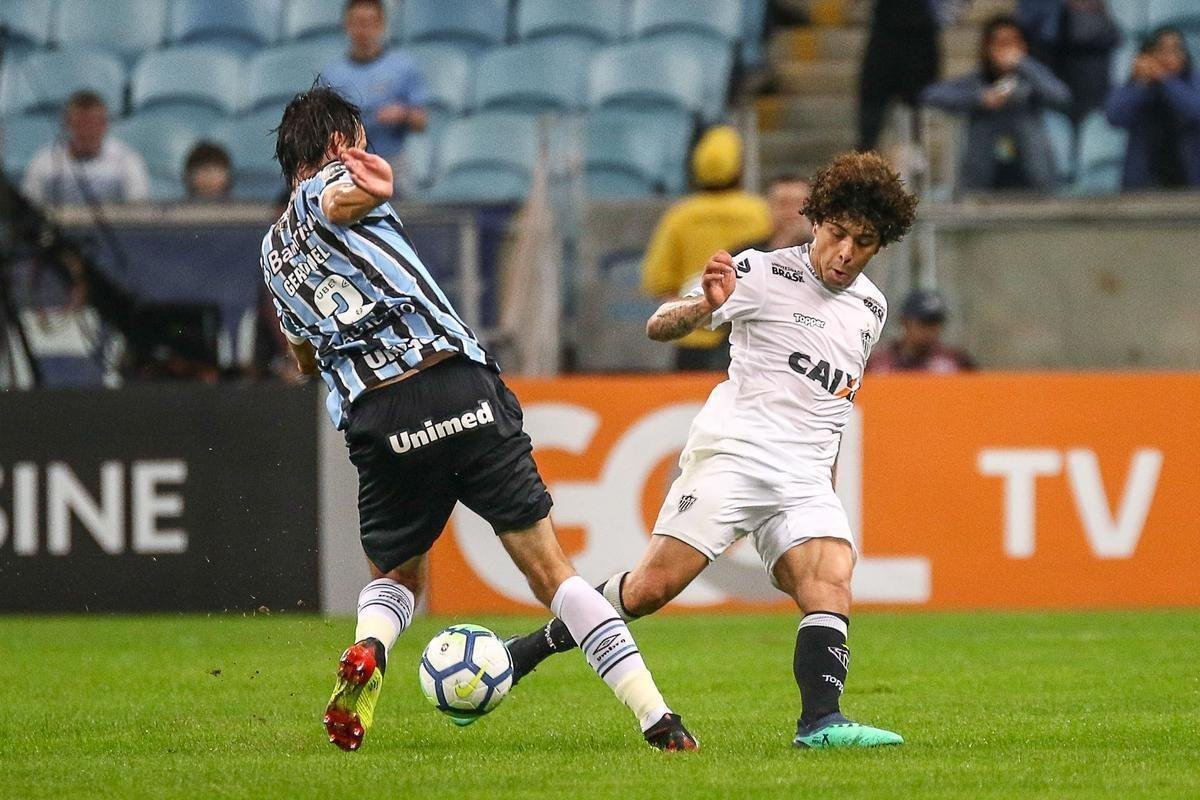 Grmio jogou melhor e conseguiu vitria por 2 a 0 sobre o Atltico na Arena, em Porto Alegre, pela 13 rodada do Campeonato Brasileiro
