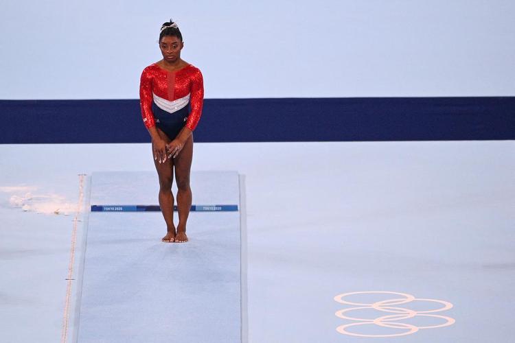 Fotos de Simone Biles durante os Jogos de Tóquio
