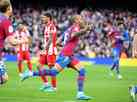 Com gol e expulso de Daniel Alves, Barcelona vence Atltico de Madrid