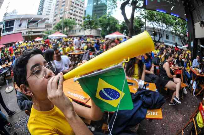 At Savassi, in Belo Horizonte, fans celebrate Sele's rout