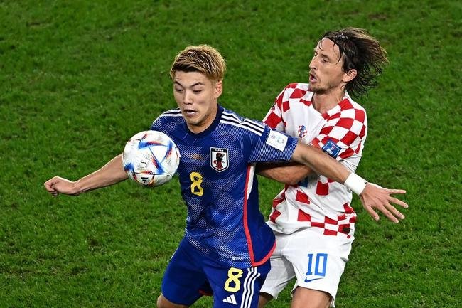Lances da partida entre Japo e Crocia, pelas oitavas de final da Copa do Mundo.