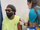dolo do Atltico, Ronaldinho Gacho  vacinado contra a COVID-19