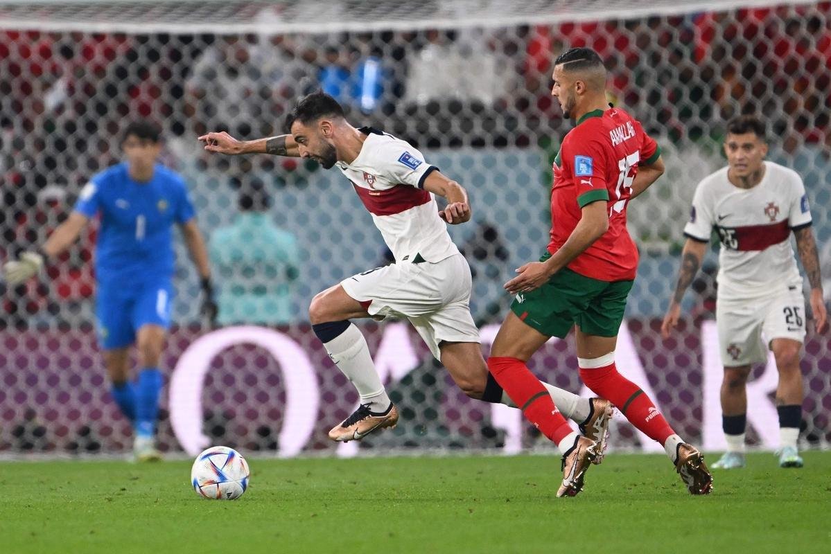Fotos do gol de Youssef En-Nesyri, de Marrocos, sobre Portugal, pelas quartas de final da Copa do Mundo de 2022, no Catar