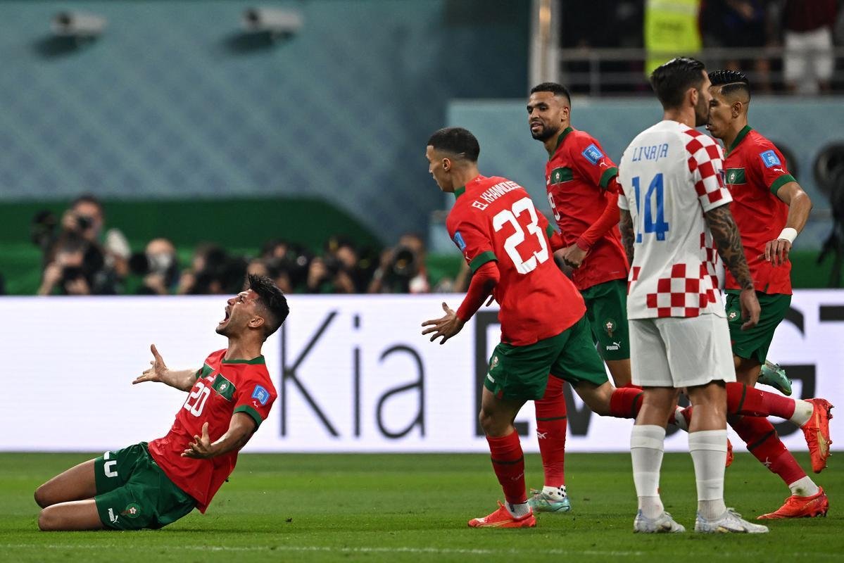 Achraf Dari empatou para o Marrocos menos de dois minutos depois de a Crocia sair na frente: 1 a 1