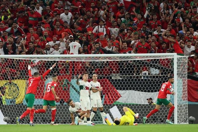 Fotos do gol de Youssef En-Nesyri, de Marrocos, sobre Portugal, pelas quartas de final da Copa do Mundo de 2022, no Catar