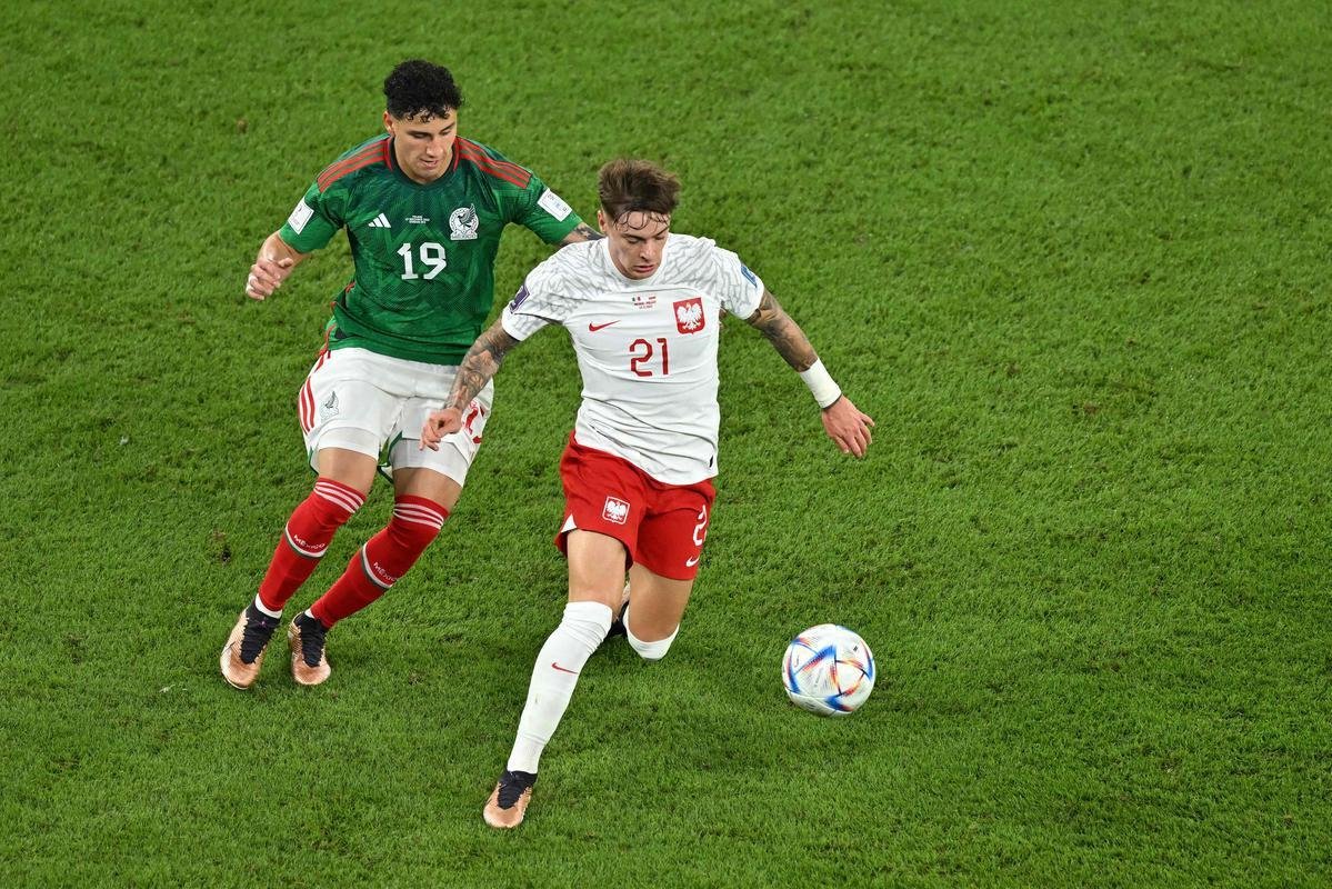 Imagens do jogo entre Mxico e Polnia, pelo Grupo C da Copa do Mundo.