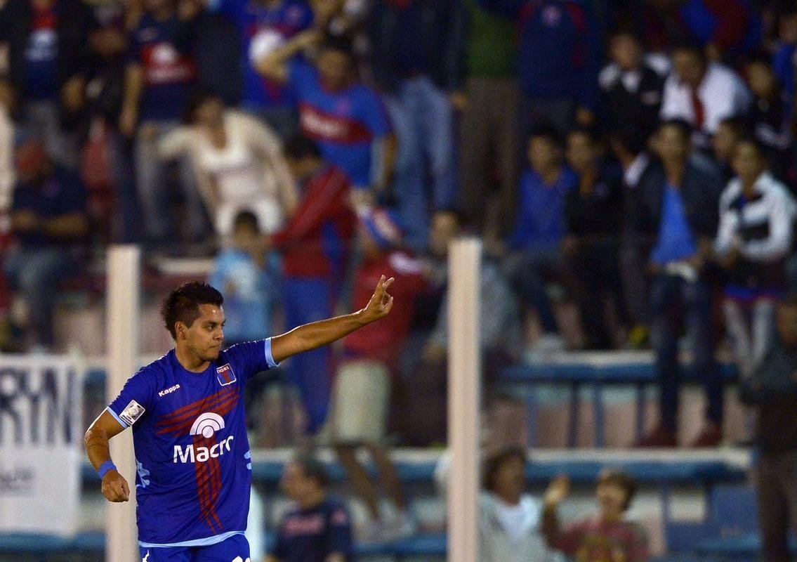 Em 2013, o Tigre-ARG passou com trs vitrias, nenhum empate e trs derrotas. O time foi eliminado nas oitavas de final.