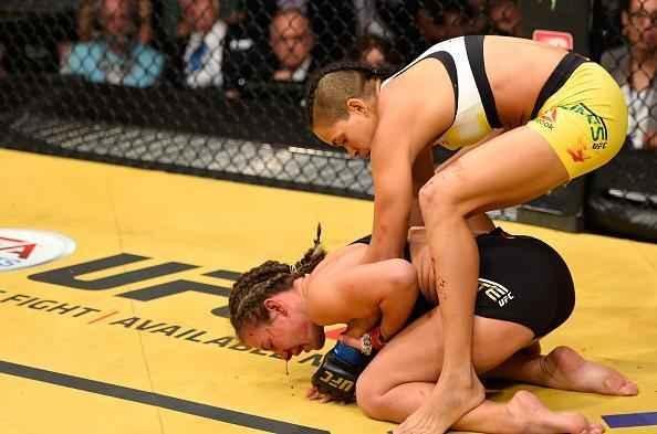 Fotos da grande vitória de Amanda Nunes pelo cinturão do UFC