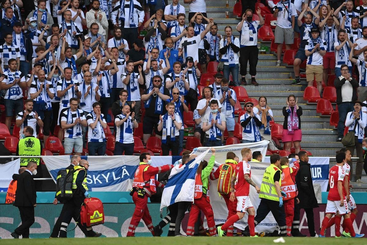 Reao de companheiros, esposa, adversrios e torcedores aps queda de Eriksen