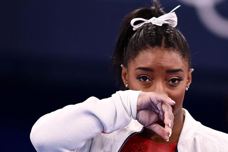Fotos de Simone Biles durante os Jogos de Tóquio