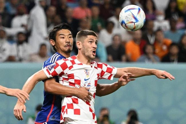 Lances da partida entre Japo e Crocia, pelas oitavas de final da Copa do Mundo.
