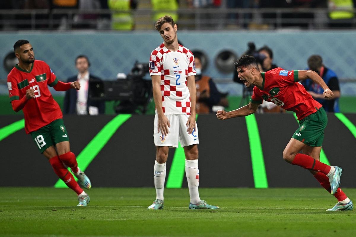 Achraf Dari empatou para o Marrocos menos de dois minutos depois de a Crocia sair na frente: 1 a 1