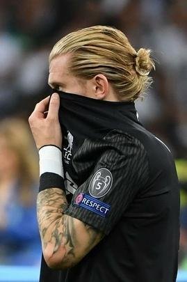 Decepo de jogadores e torcedores do Liverpool com perda do ttulo da Liga dos Campees para o Real