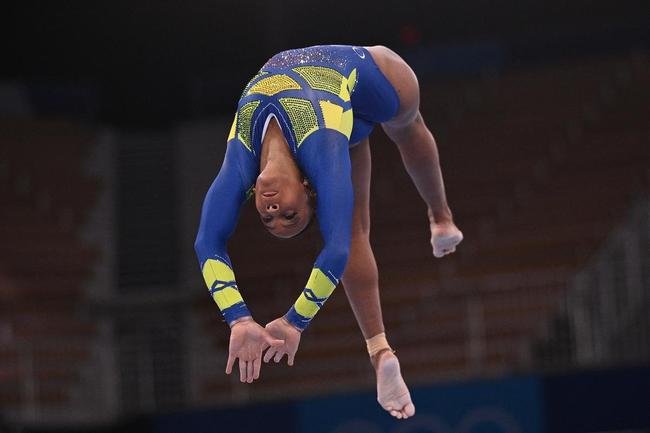 Fotos da apresentao da brasileira Rebeca Andrade na ginstica artstica dos Jogos Olmpicos de Tquio