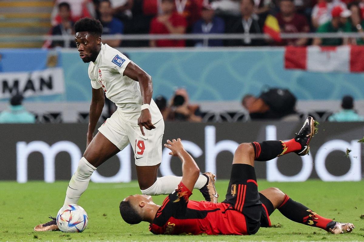 Fotos do jogo entre Blgica e Canad pelo Grupo F da Copa do Mundo