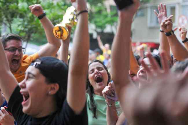At Savassi, in Belo Horizonte, fans celebrate Sele's rout