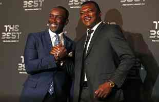 Os ex-craques Dwight Yorke e Marcel Desailly 