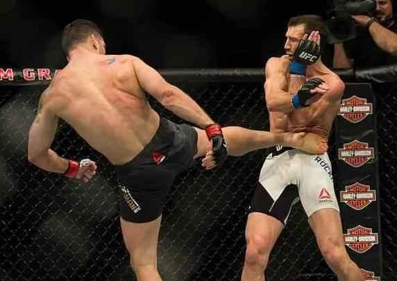 Fotos da batalha entre Luke Rockhold e Chris Weidman