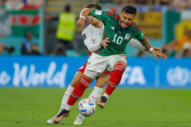 Imagens do jogo entre Mxico e Polnia, pelo Grupo C da Copa do Mundo.