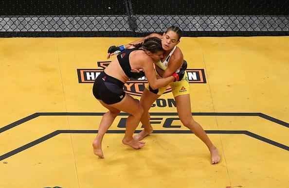 Fotos da grande vitória de Amanda Nunes pelo cinturão do UFC