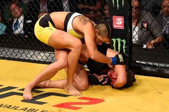 Fotos da grande vitória de Amanda Nunes pelo cinturão do UFC