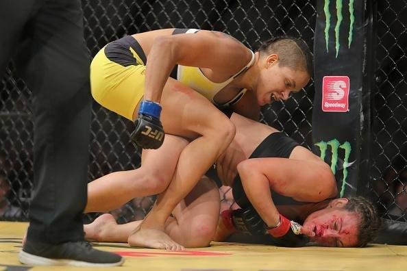 Fotos da grande vitória de Amanda Nunes pelo cinturão do UFC