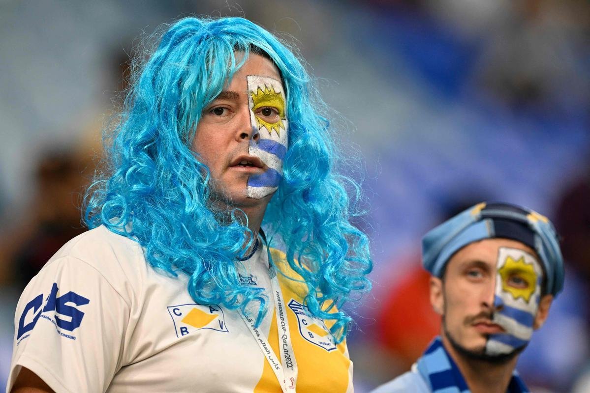 Ganeses e uruguaios acompanham partida pelo Grupo H da Copa do Mundo 